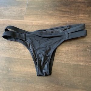 Cheeky black bikini bottoms